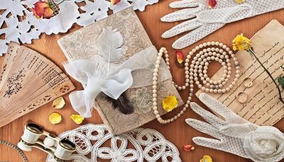 operaglasses, feather, fan, letter, rose, petals, gloves, bow, ring, pearls, diary