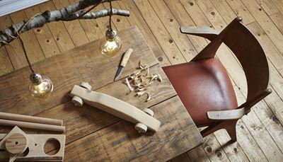 woodenfloor, baseboard, chairback, armrest, hole, branch, chair, shavings, knife, cable, toy, bulb