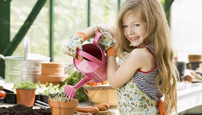 girl, wateringcan, waterjet, greenhouse, sprout, apron, smile, glove, soil, pot