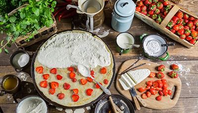 curd, cuttingboard, pancake, vanilla, batter, strawberries, basket, basil, flour, ladle, filling, spoon