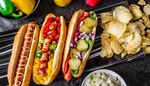 hotdog, onion, bun, ketchup, sweetpepper, chips, mustard, sausage, pickles