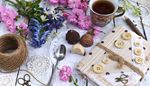 spoon, scissors, candies, pencil, flowers, button, lace, diary, beads, twine, tea