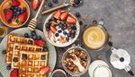 plate, coffeepot, strawberries, blueberries, waffle, honey, granola, foam, cream, spoon