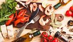 fork, cuttingboard, crayfish, baguette, peppercorns, bayleaf, herbs, spices, shrimp, oil, lemon