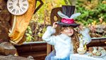 clockhand, tablecloth, tophat, furcoat, teaparty, makeup, alice, teapot, spout, numerals, ears, cake